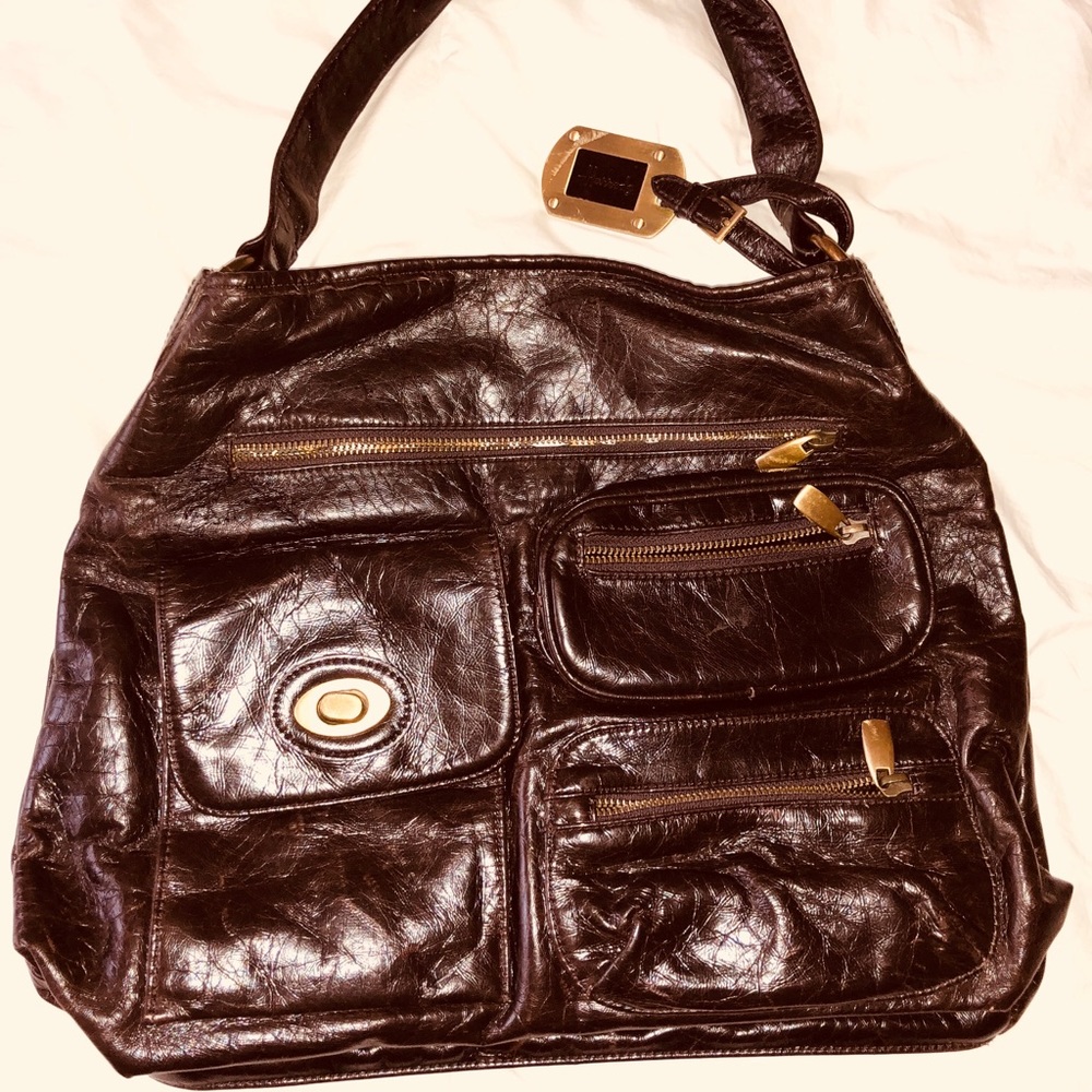 Harold’s brown leather purse